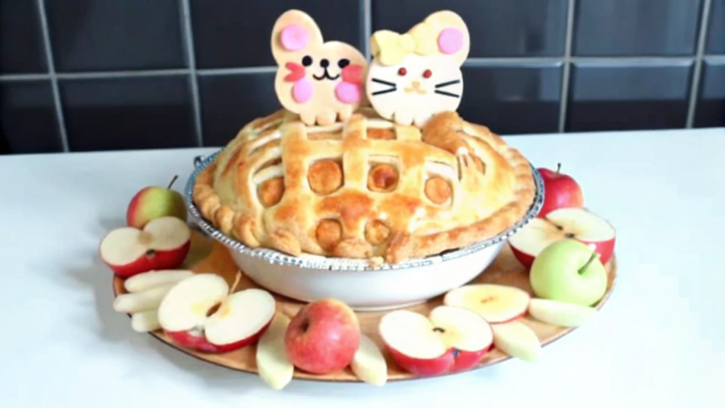 "Red Bow Apple Pie served on a plate in Hello Kitty Island Adventure"